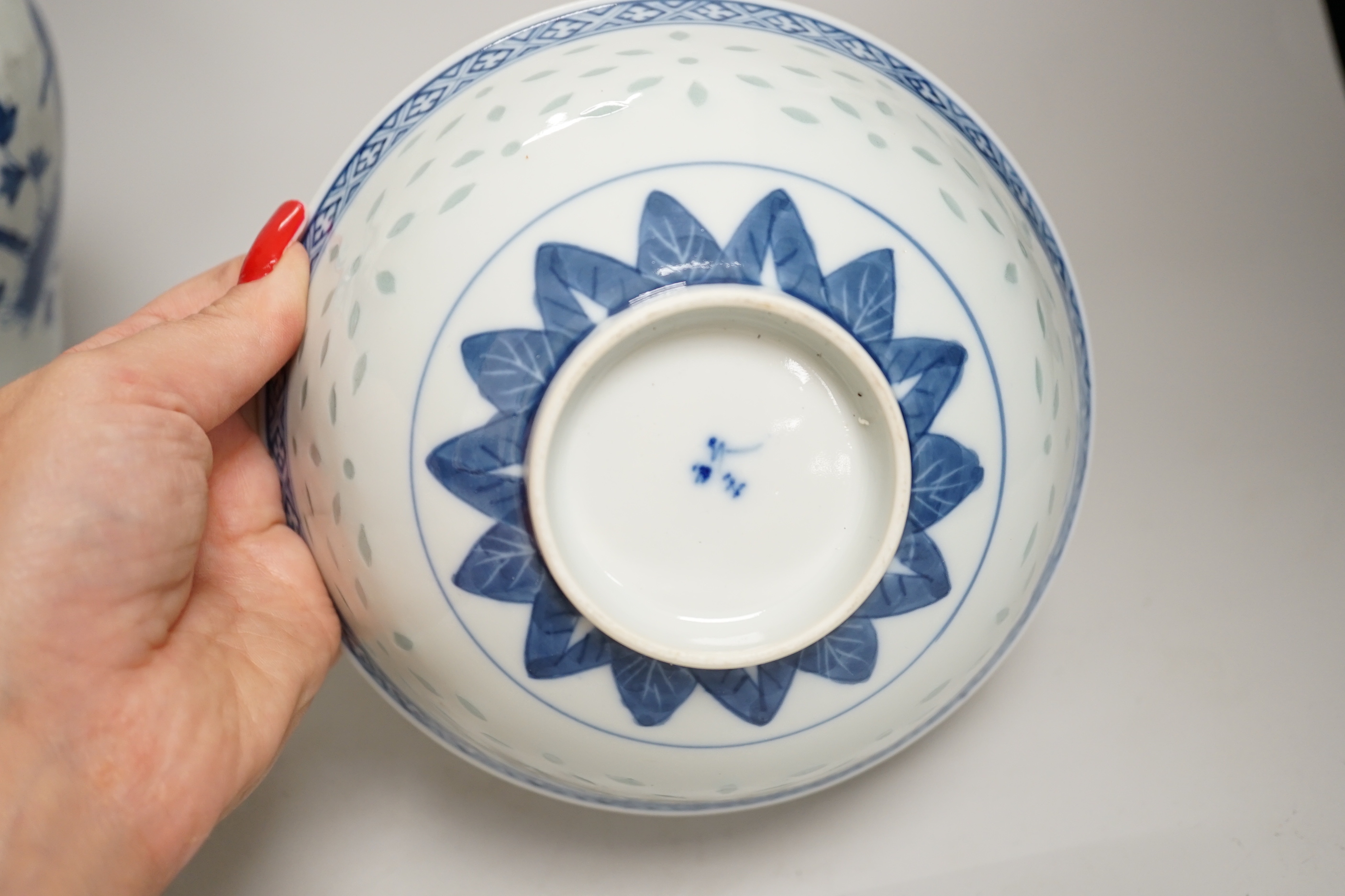 Chinese blue and white ceramics and a miniature famille rose vase, the largest 25cm high